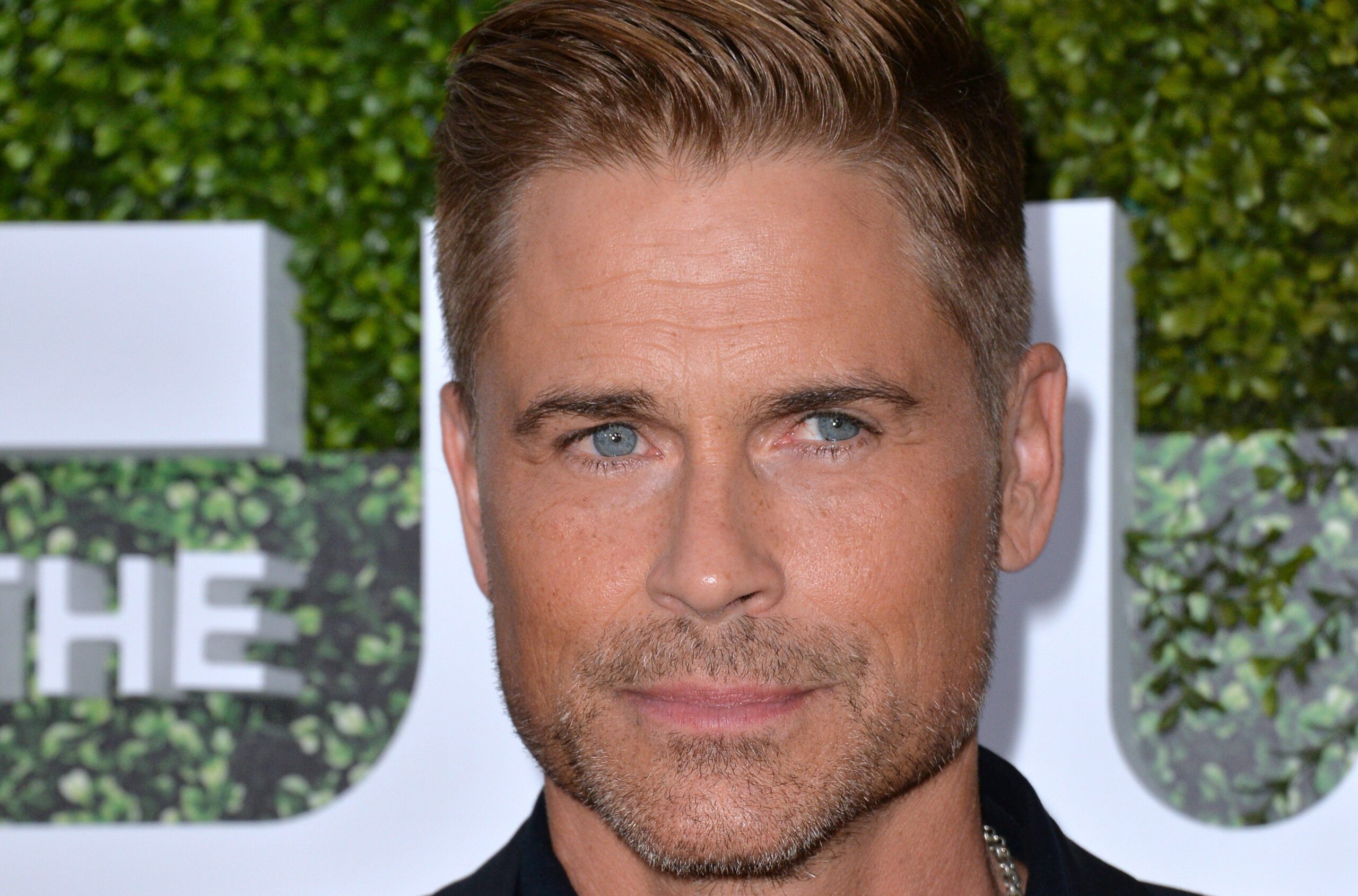 Rob Lowe wearing a button down shirt at the CBS & Showtime Annual Summer TCA Party with the Stars