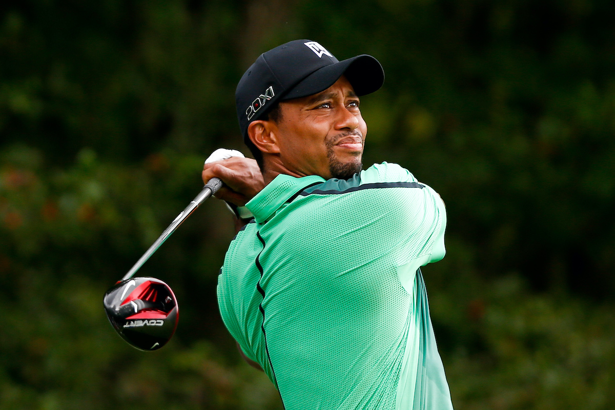 Tiger woods swinging a golf club