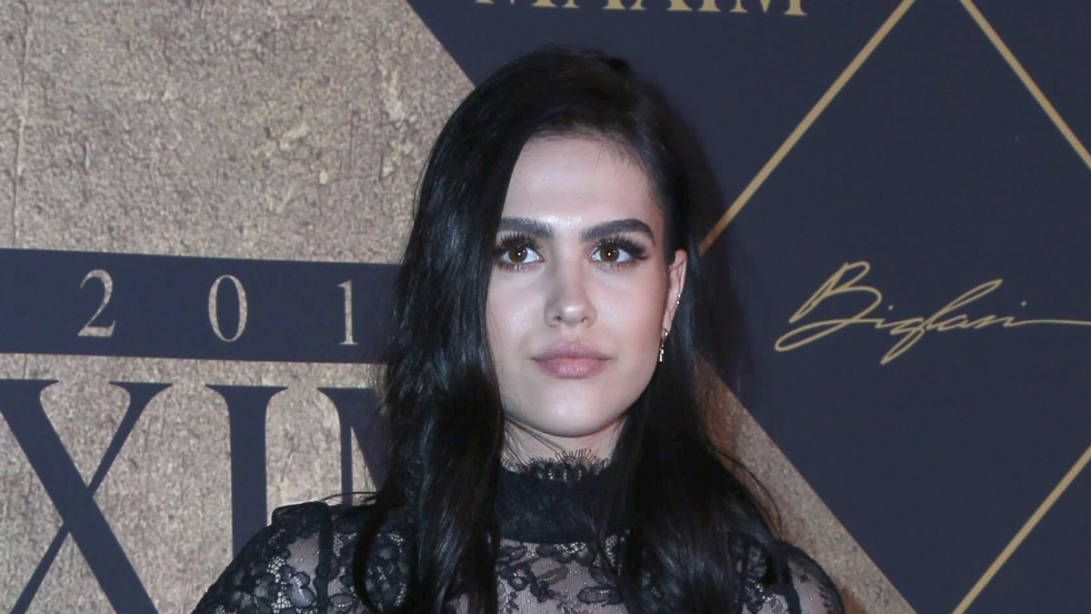 Amelia Hamlin wears a lacy black jumpsuit on the red carpet