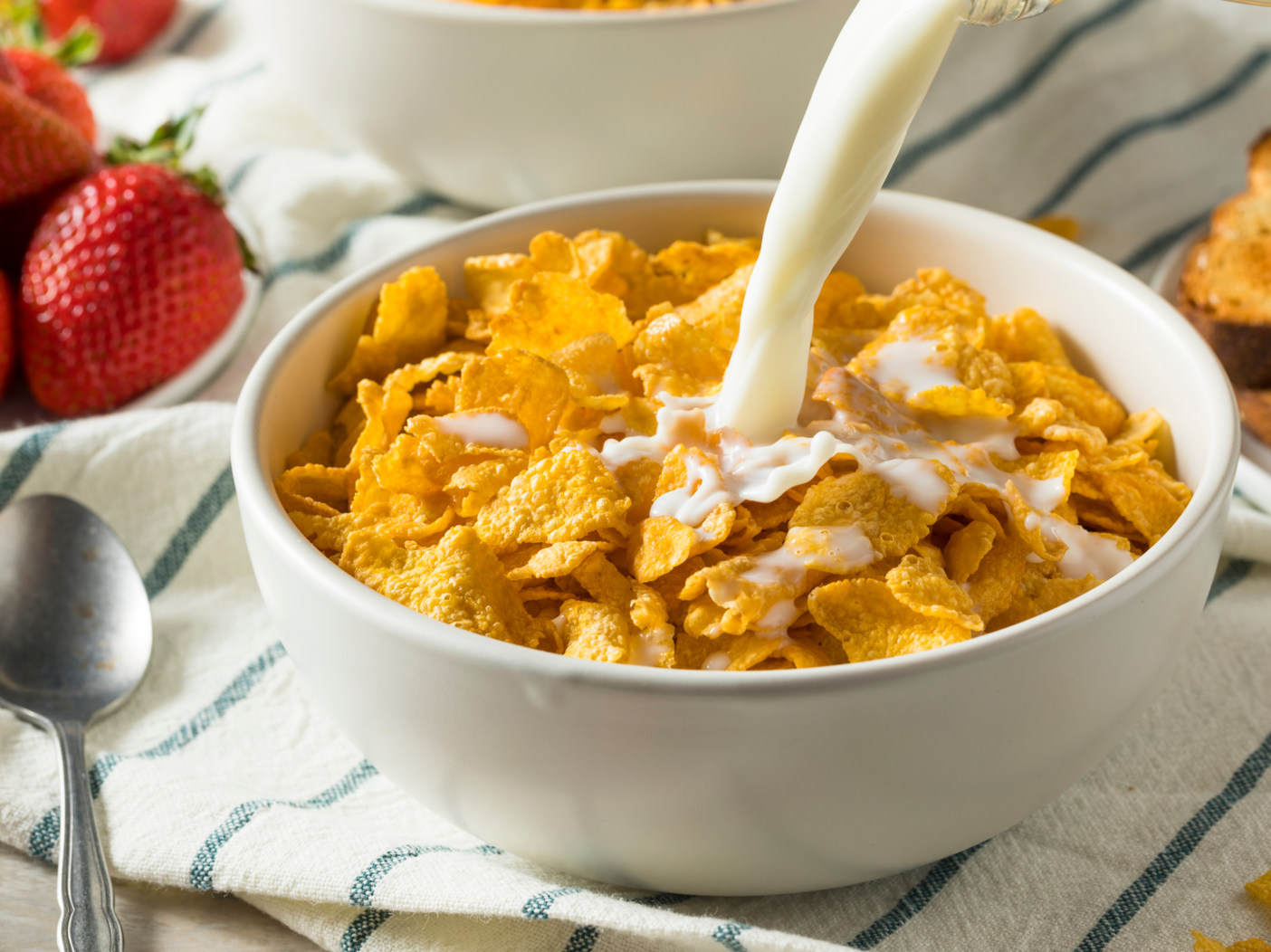 Healthy Corn Flakes with Milk for Breakfast with Fruit