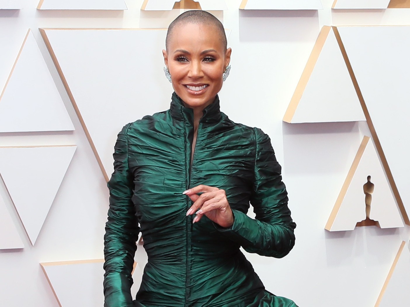 Jada Pinkett Smith smiles in green gown