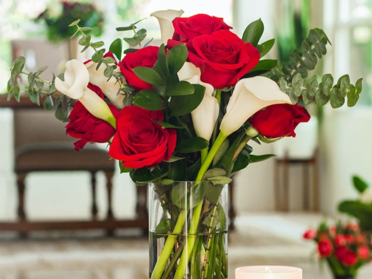 A red and white floral bouquet from BloomysBox