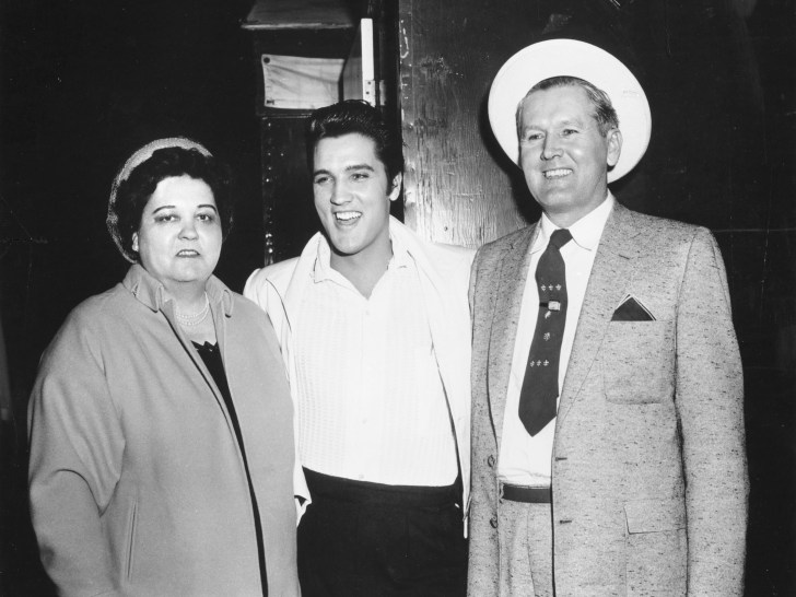 Rock and roll singer Elvis Presley with his parents Vernon and Gladys in 1961