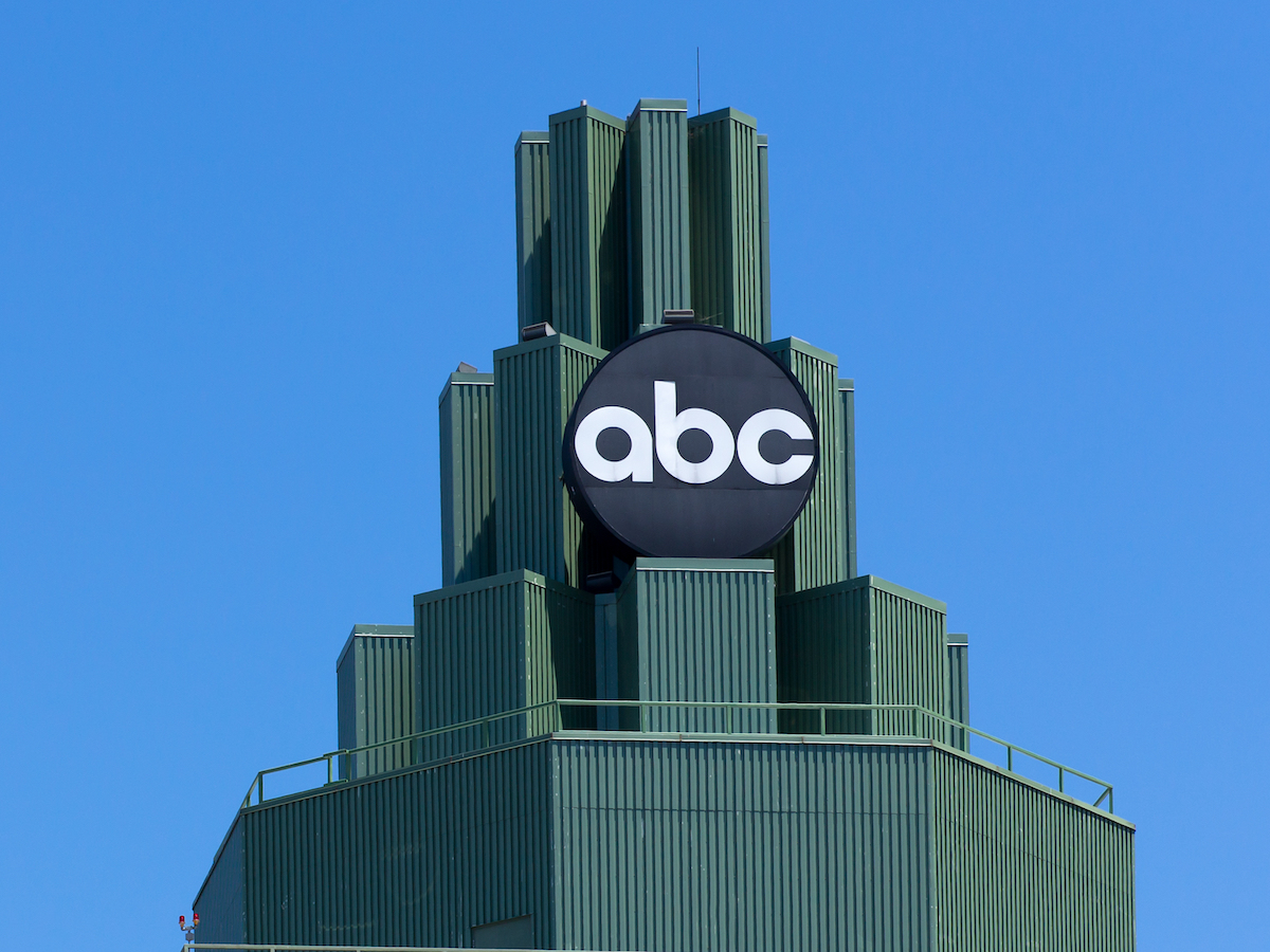 photo of the top of the Burbank ABC building against a blue sky