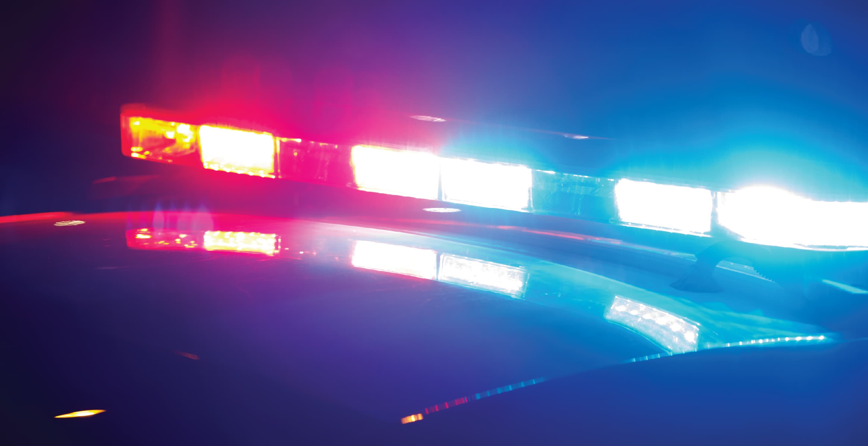 Police Car Emergency Lights At Scene